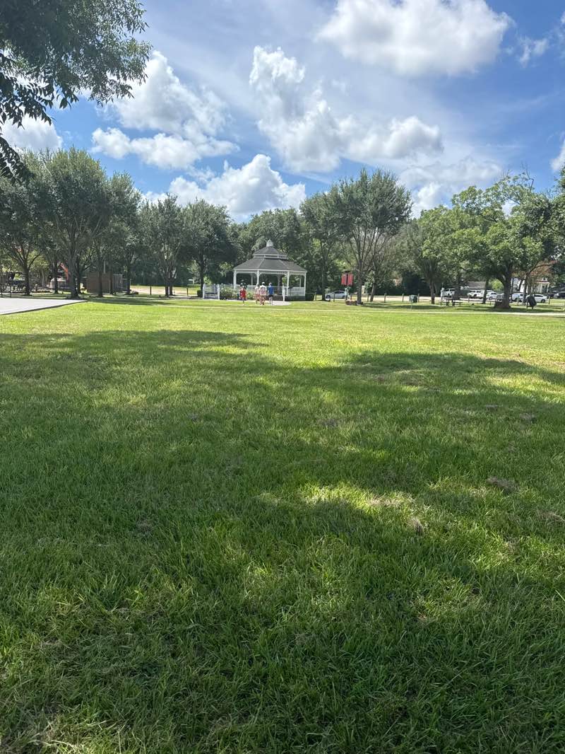 walking near me in Tomball Depot Plaza in summer