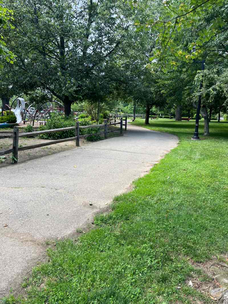 walking near me in Village Green Park in summer