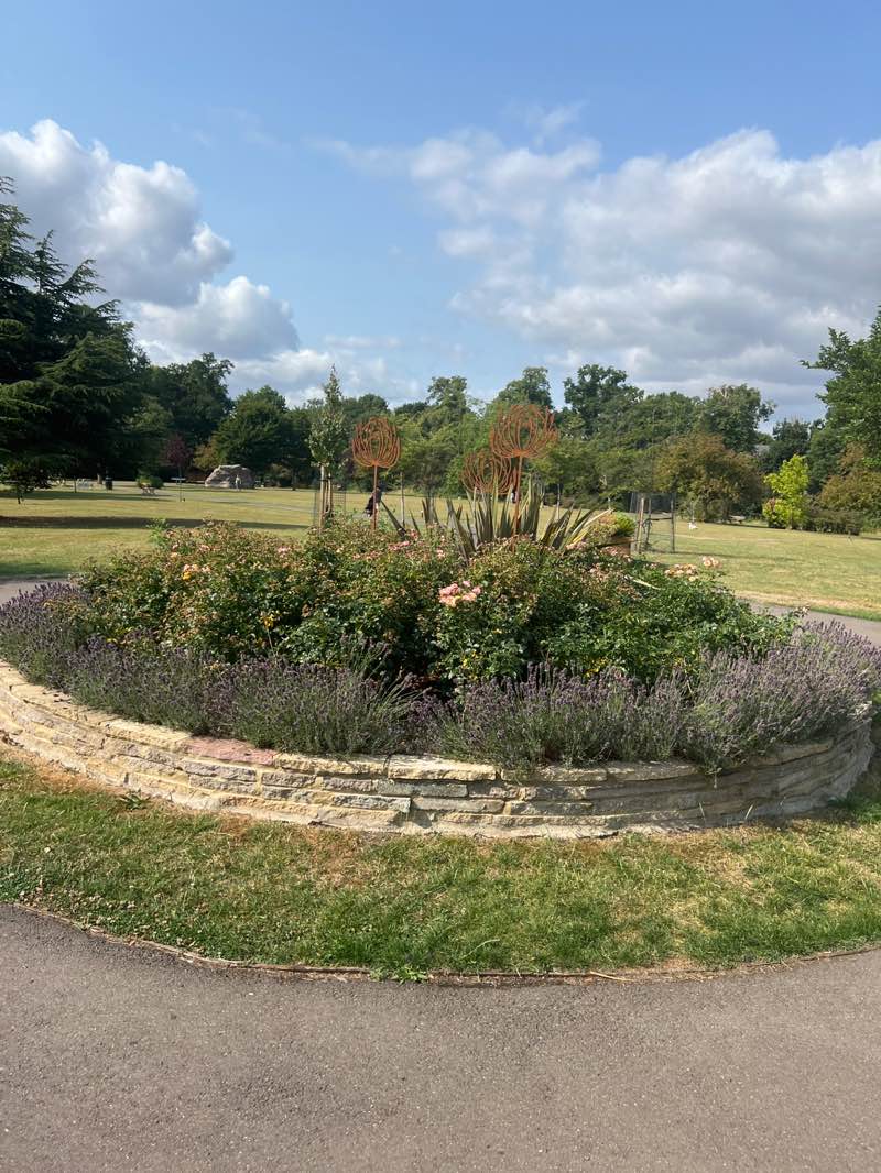 walking near me in Pinner Village Gardens in summer