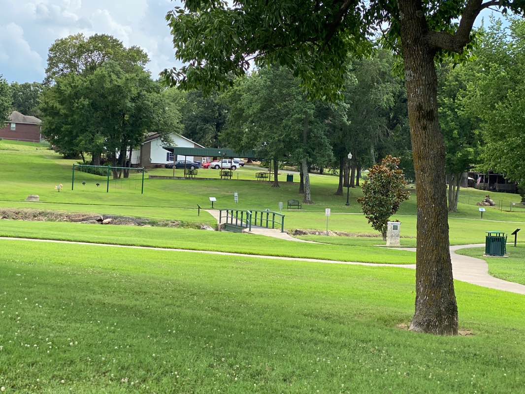 walking near me in Muldrow City Park in summer