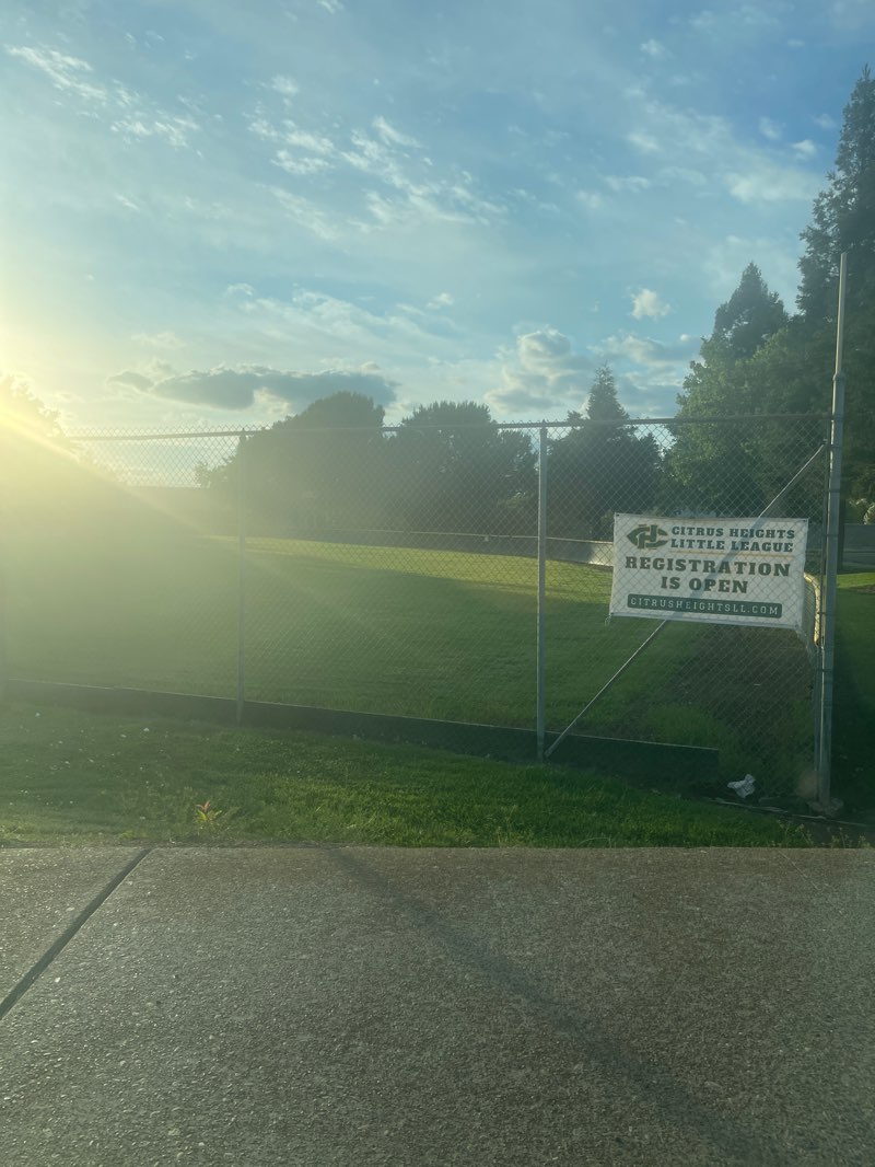 walking near me in McDonald Field in summer