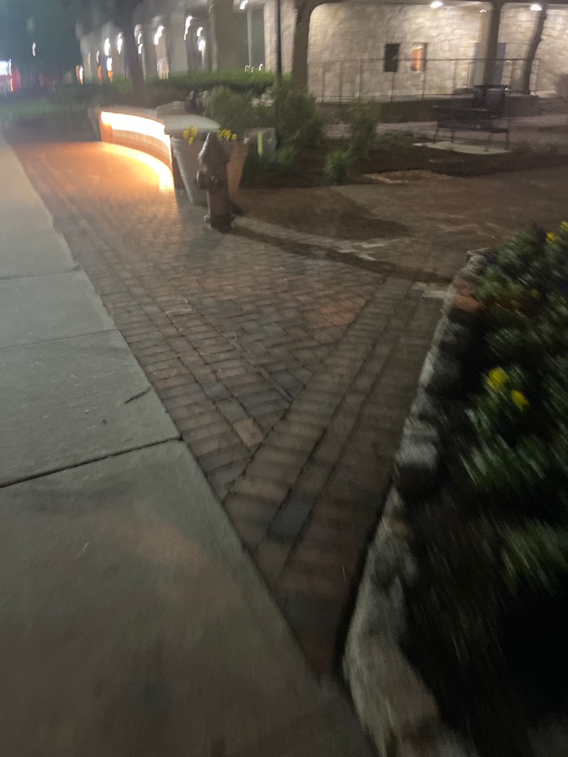 walking near me in Norman Samuels Plaza in spring