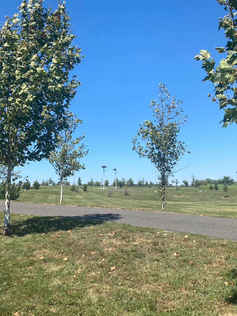 walking near me in Cramer Hill Waterfront Park in autumn