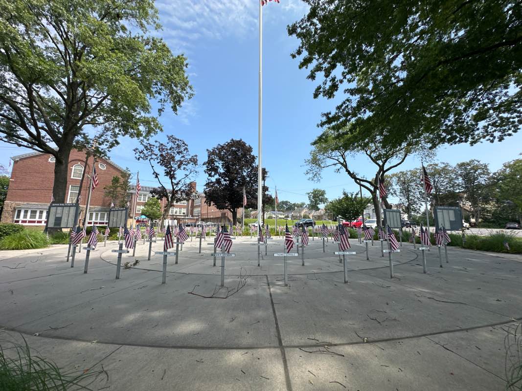 walking near me in Veterans Honor roll & Memorial Park in autumn