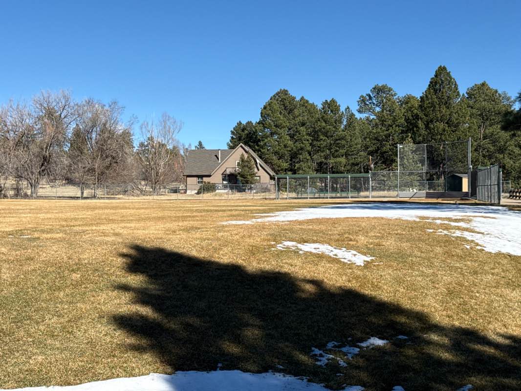 walking near me in Whispering Pines Park in spring