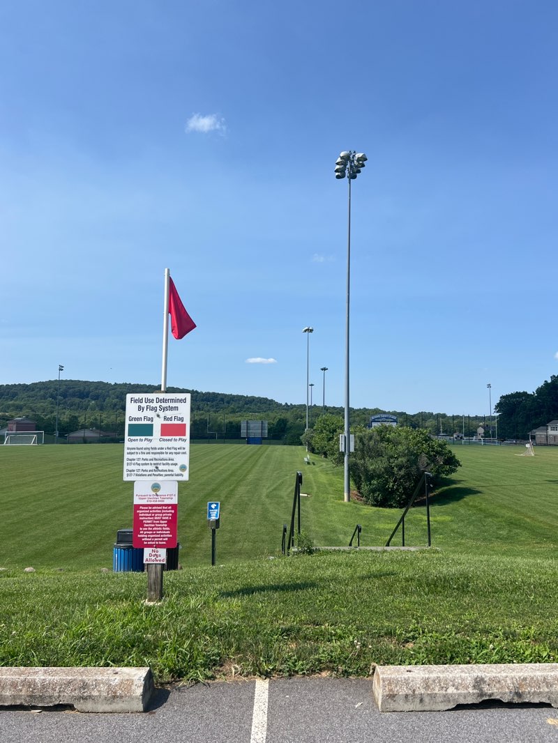walking near me in Fellowship Field in summer