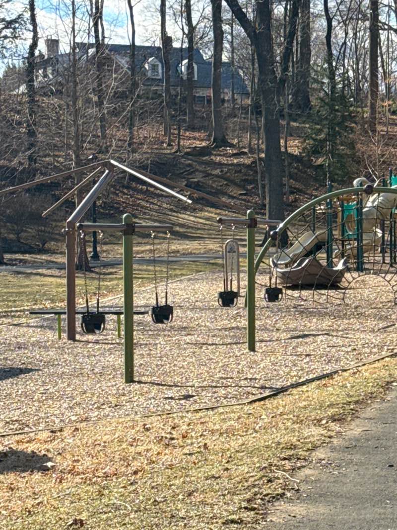 walking near me in Happy Hollow Playground in spring