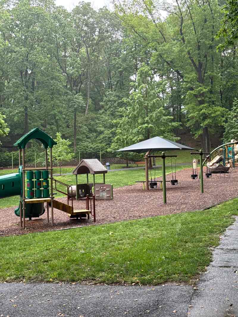 walking near me in Happy Hollow Playground in spring