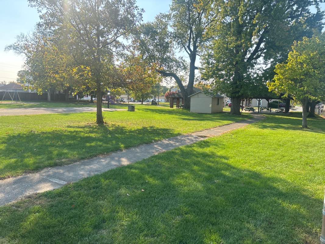 walking near me in Harmon Field Park in autumn