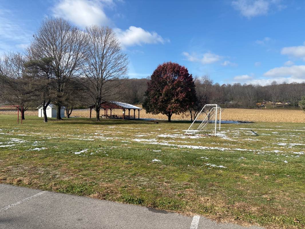 walking near me in Church Park/Ball Field in autumn