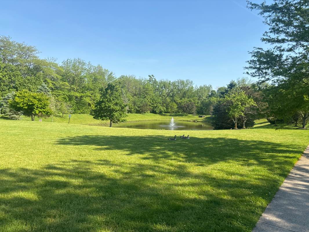 walking near me in Locust Curve Park in summer
