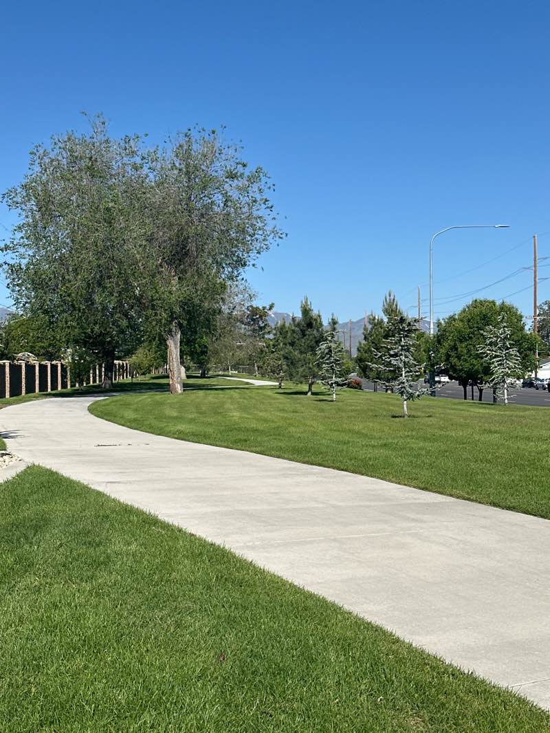 walking near me in Kearns Linear Parkway in spring