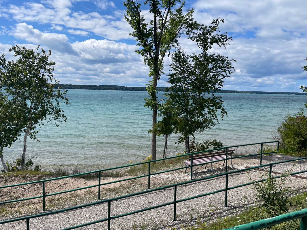 walking near me in Torch Lake Public Water Acces Site in autumn