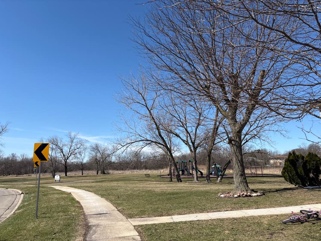 walking near me in Mill Meadows Park in spring