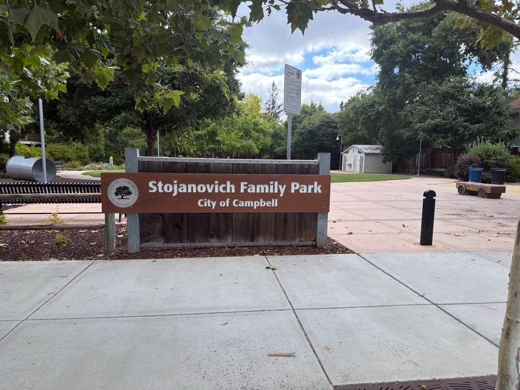 walking near me in Stojanovich Family Park in summer
