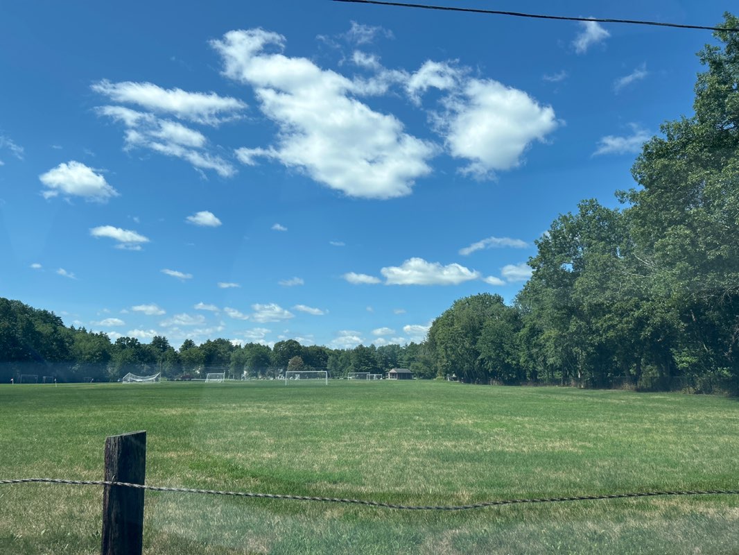walking near me in Jack Walsh Field in summer