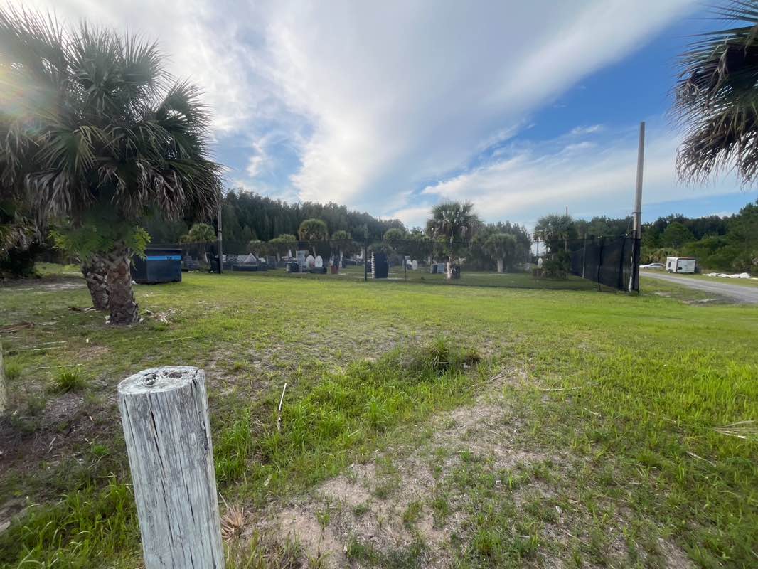 walking near me in Palm Bay Paintball Park in spring