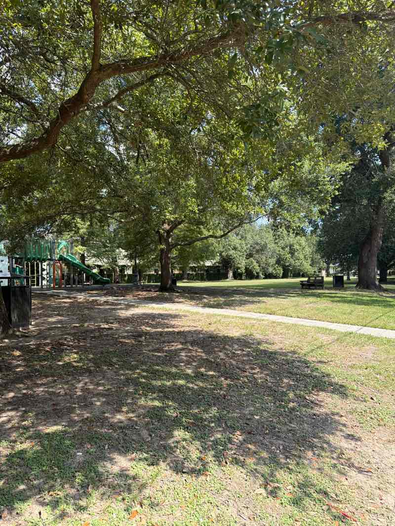 walking near me in Danneel Playground in summer