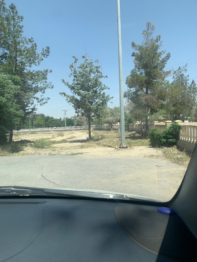 walking near me in Park Outside of Musa Stadium in spring