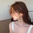 K.