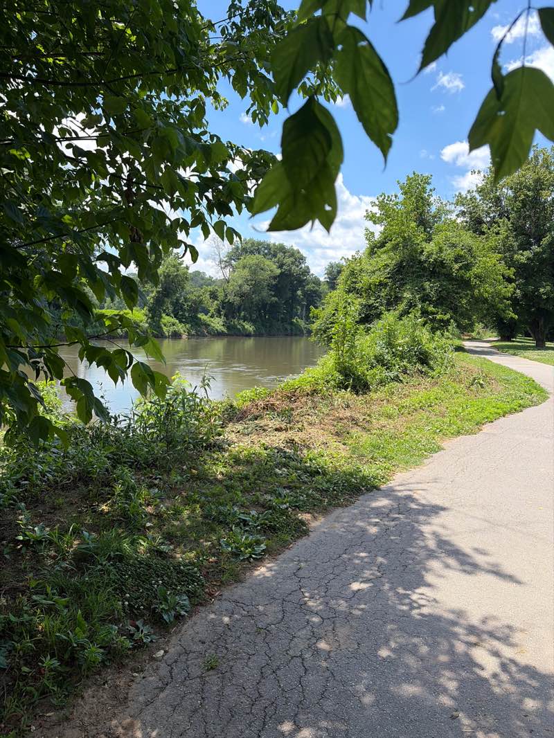 walking near me in Amboy Road River Park in summer