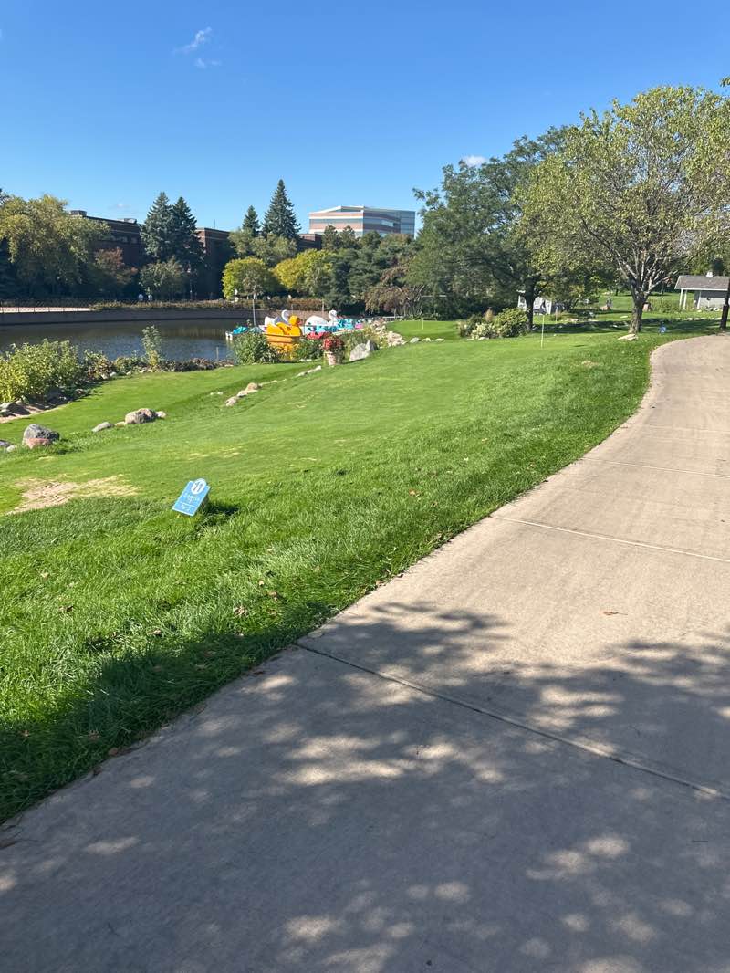 walking near me in Centennial Lakes Park in autumn