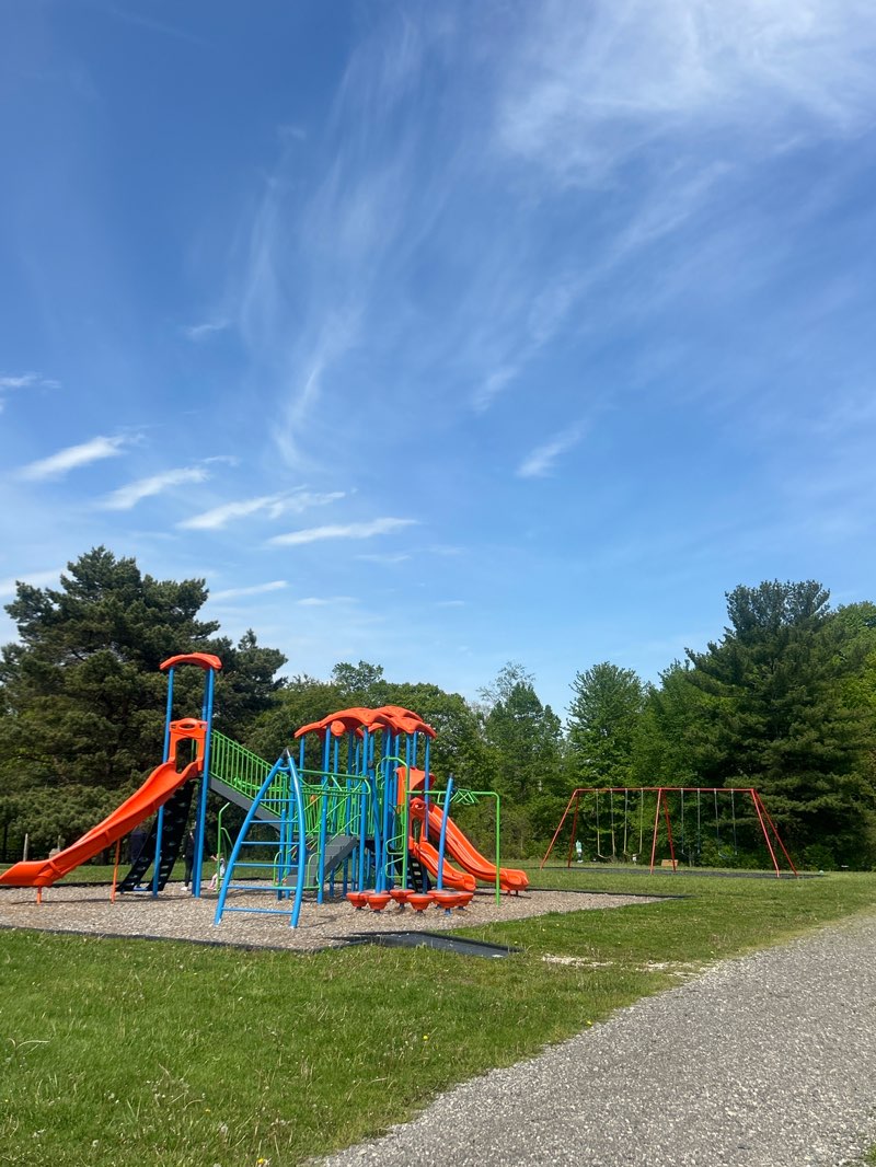 walking near me in Ira Township Park in summer