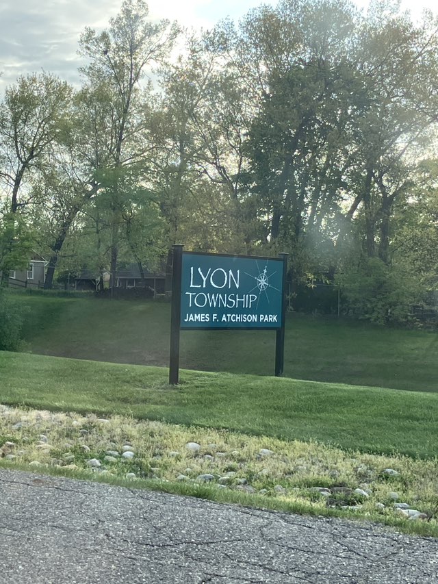 walking near me in James F. Atchison Park in spring