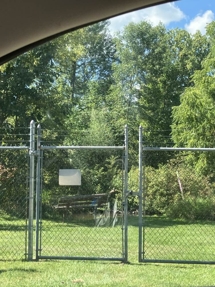 walking near me in Village of Holly Open Space in autumn