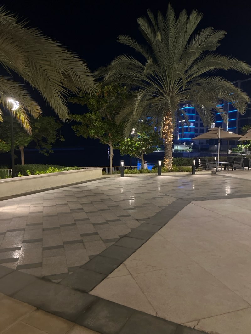 walking near me in Al Mouj Entrance Park Walkway in winter
