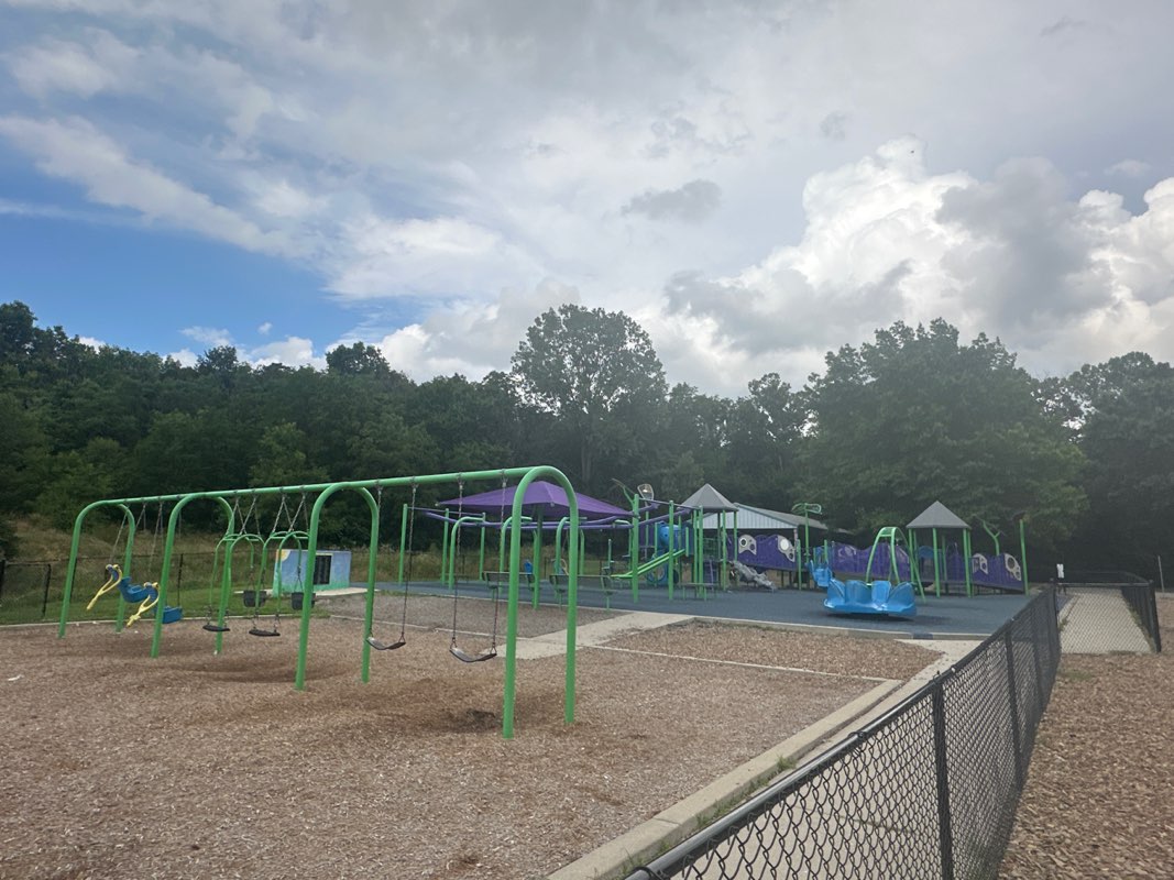 walking near me in Cave Hollow Park in summer