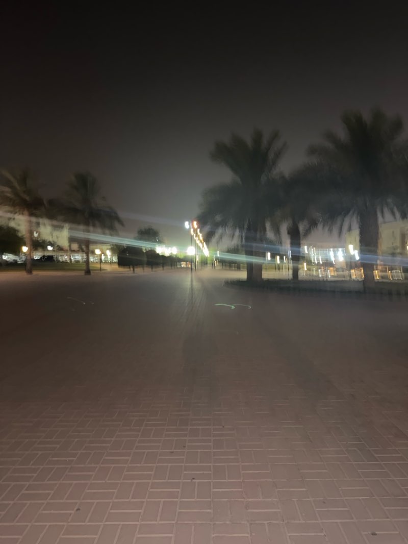 walking near me in Barwa City Central Park in summer