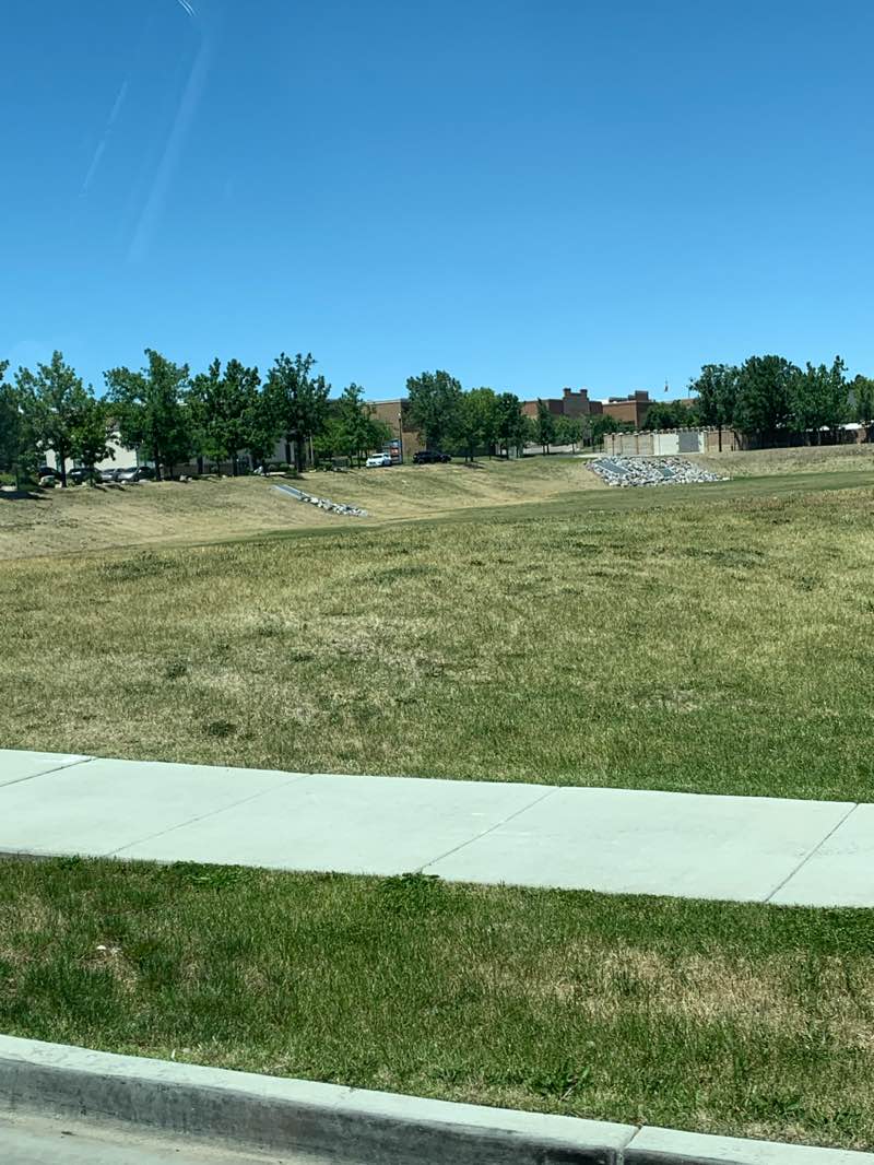 walking near me in District Detention Basin Park in summer