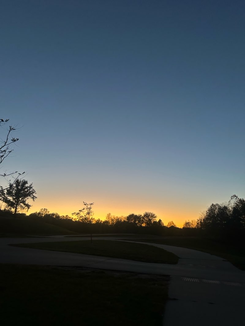 walking near me in Standing Bear Lake Park in autumn
