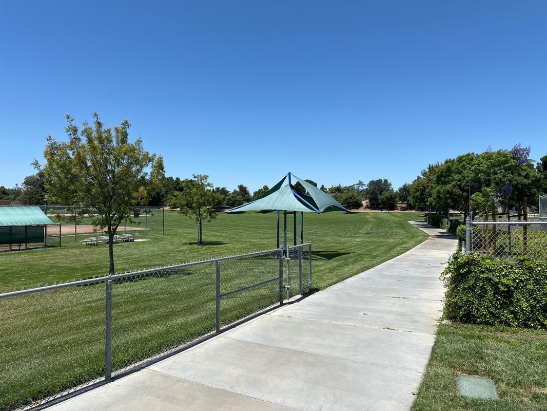 walking near me in Laurel Ballfields Park in summer