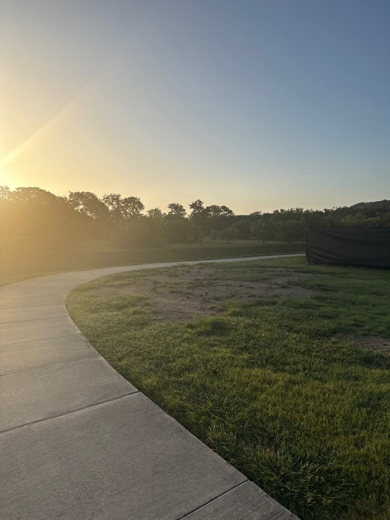 walking near me in Bluffview Leander - Amenity Center in summer