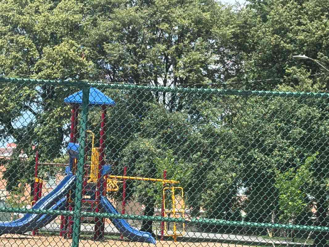 walking near me in Giffen Elementary Playground in summer