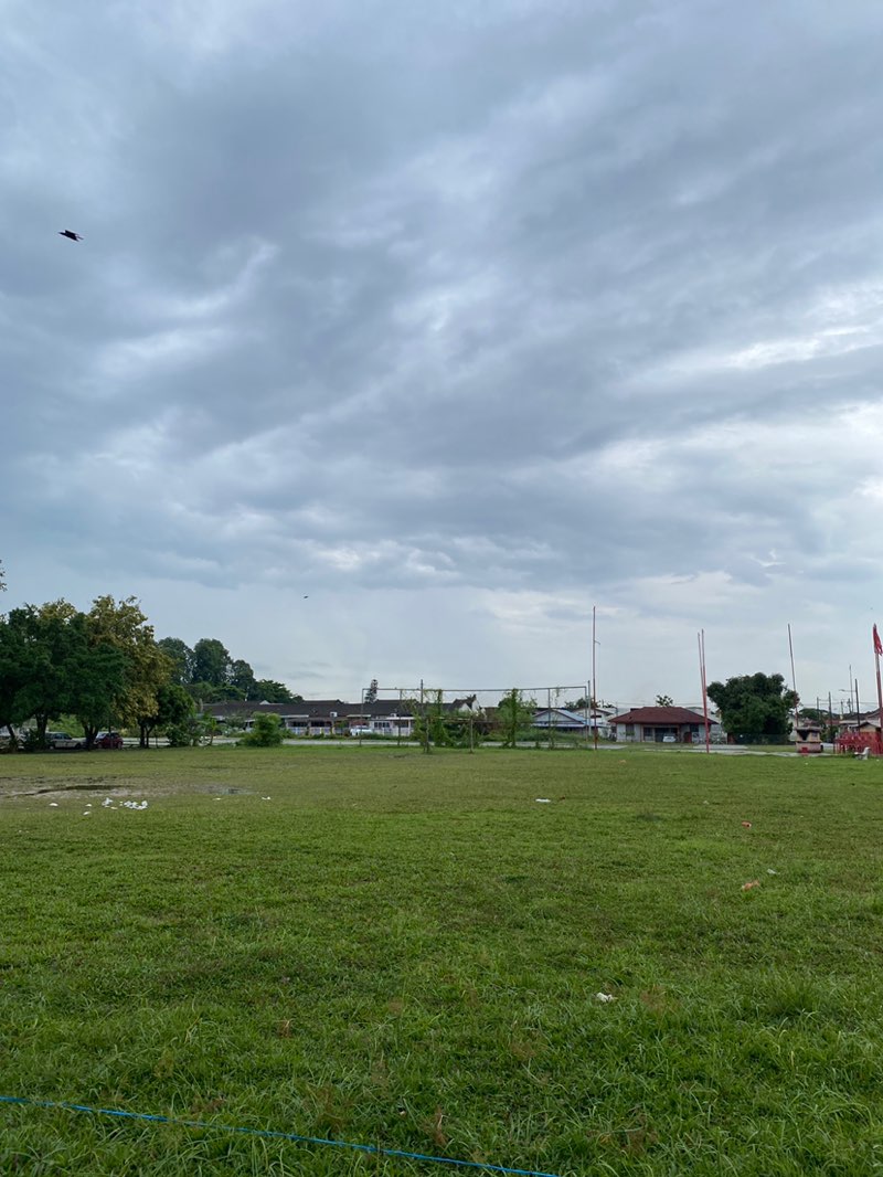 walking near me in Jalan Muda field in winter
