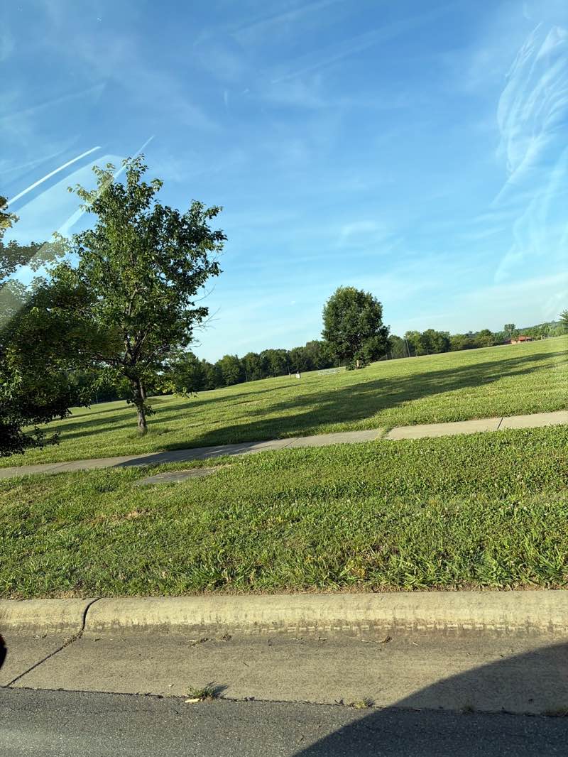 walking near me in Mallard Creek Community Park in summer