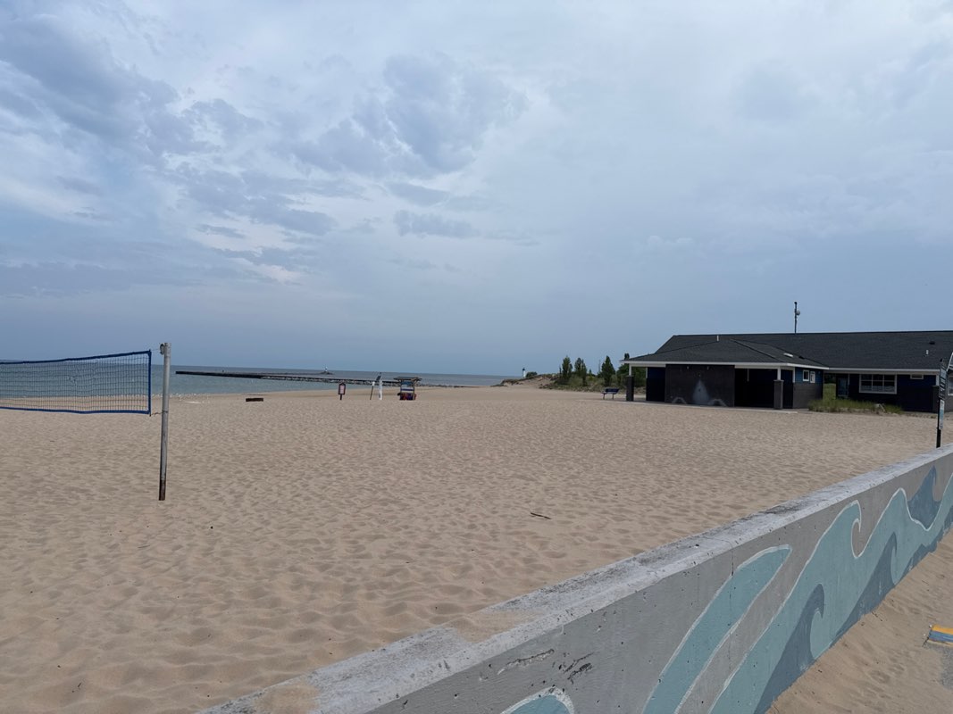walking near me in 1st Street Beach in summer