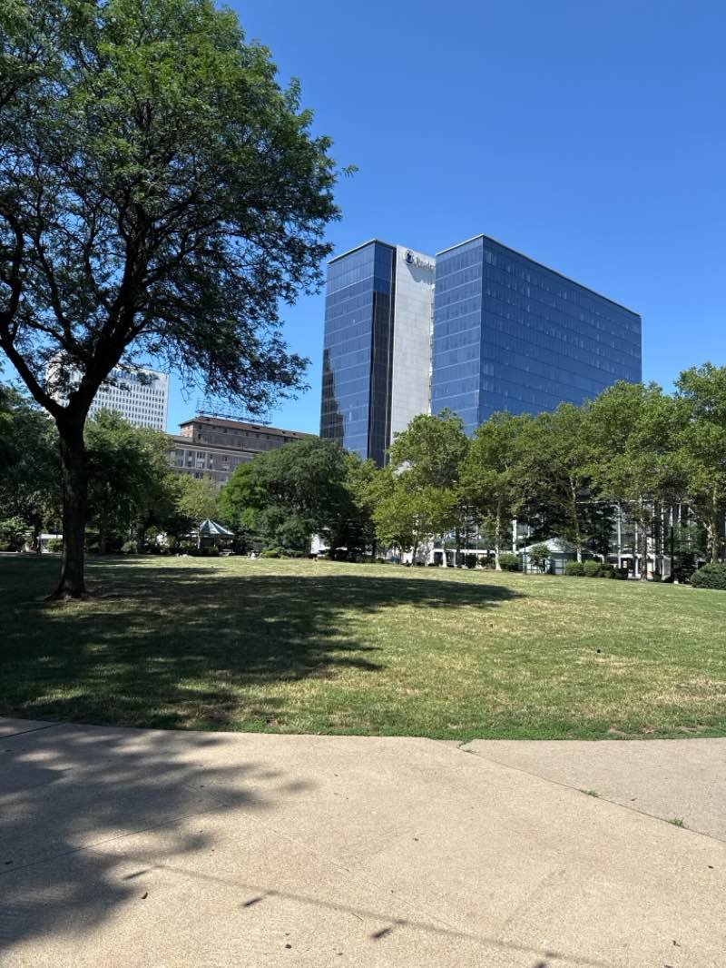 walking near me in Norman Samuels Plaza in summer