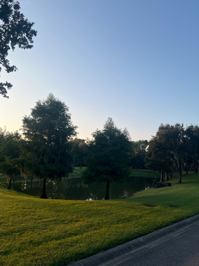 walking near me in Tuscawilla Park in summer