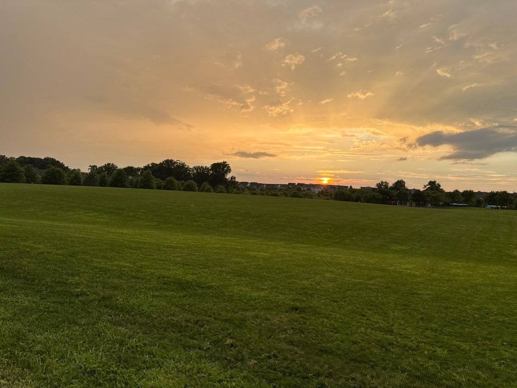 walking near me in Jeane Onufry Park at Clarksburg Village in summer
