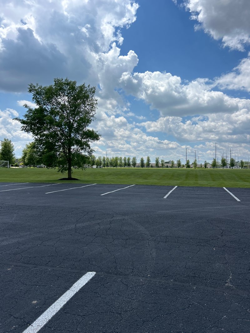 walking near me in The Settlement Community Park in spring