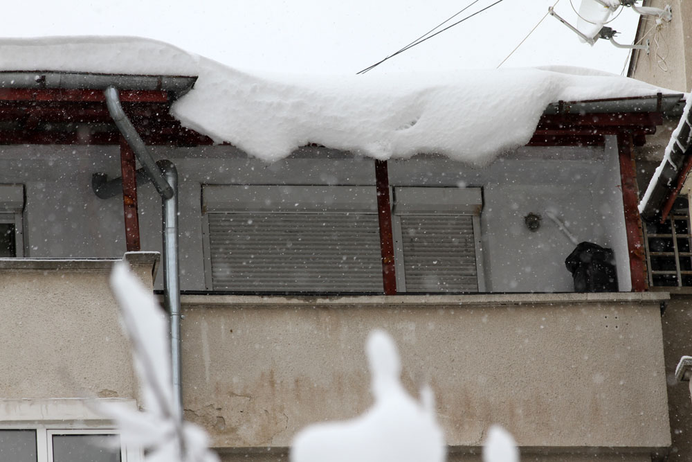 Dangerous snow causing roof to cave