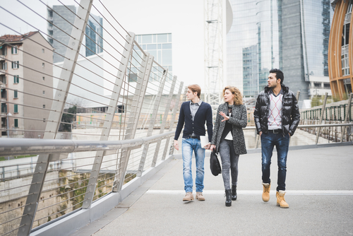Casual workers walking near an office building