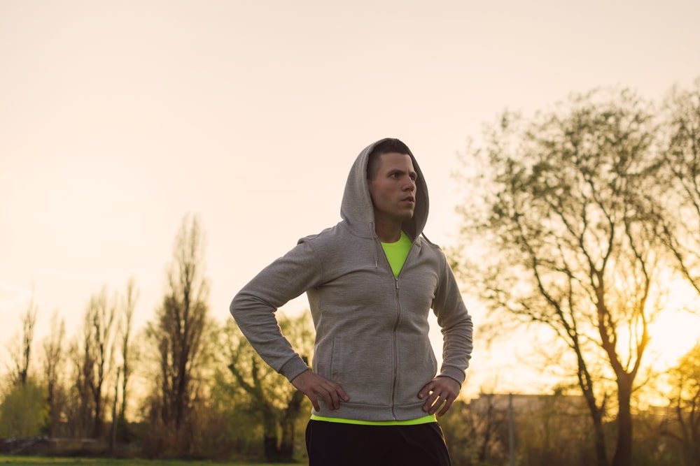 Man resting during a morning walk for fitness