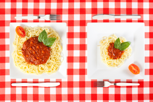 Large and small portion servings of pasta comparison