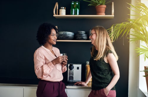 Women taking standing break at the office