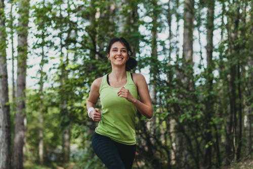 Woman walking in a natural park setting